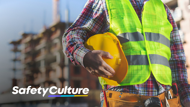 Construction worker in green safety vest with SafetyCulture logo